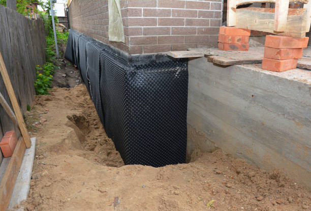 Happy homeowners after waterproofing job in Berwyn